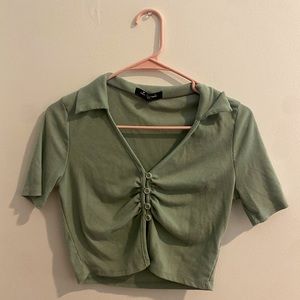 green buttoned top